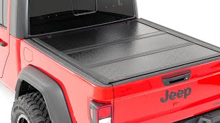 Installing Low Profile Hard Tri Fold Tonneau Cover by Rough Country [upl. by Novelia]