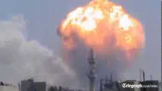 Syria weapons depot explosions leave many dead in Homs [upl. by Eilujna]