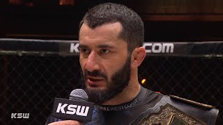 KSW 55 Mamed Khalidov spektakularnie nokautuje Askhama  Wywiad w klatce [upl. by Ahsekam723]